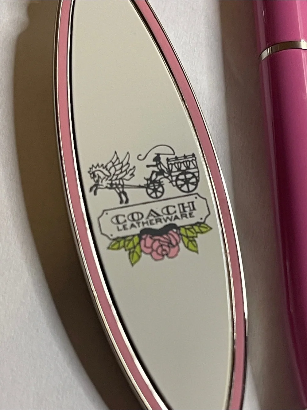 Coach Surfboard Keychain in Pink and Cream and Pink Coach Pen